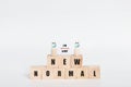 New normal with wooden block cubes and Social distancing by using wooden doll Royalty Free Stock Photo